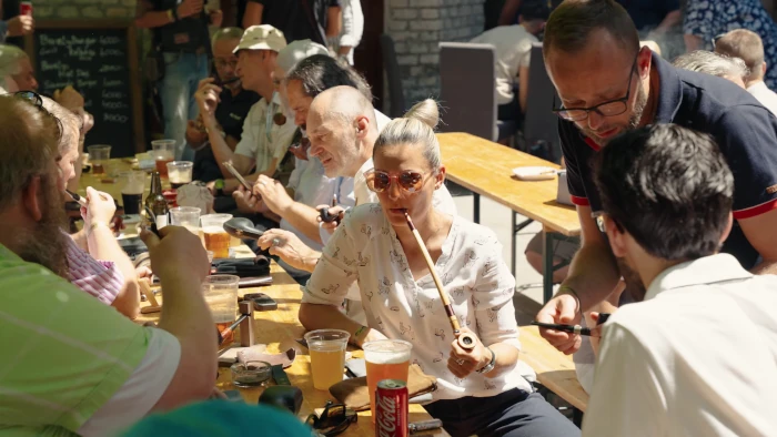 Cheerful people talking at the event